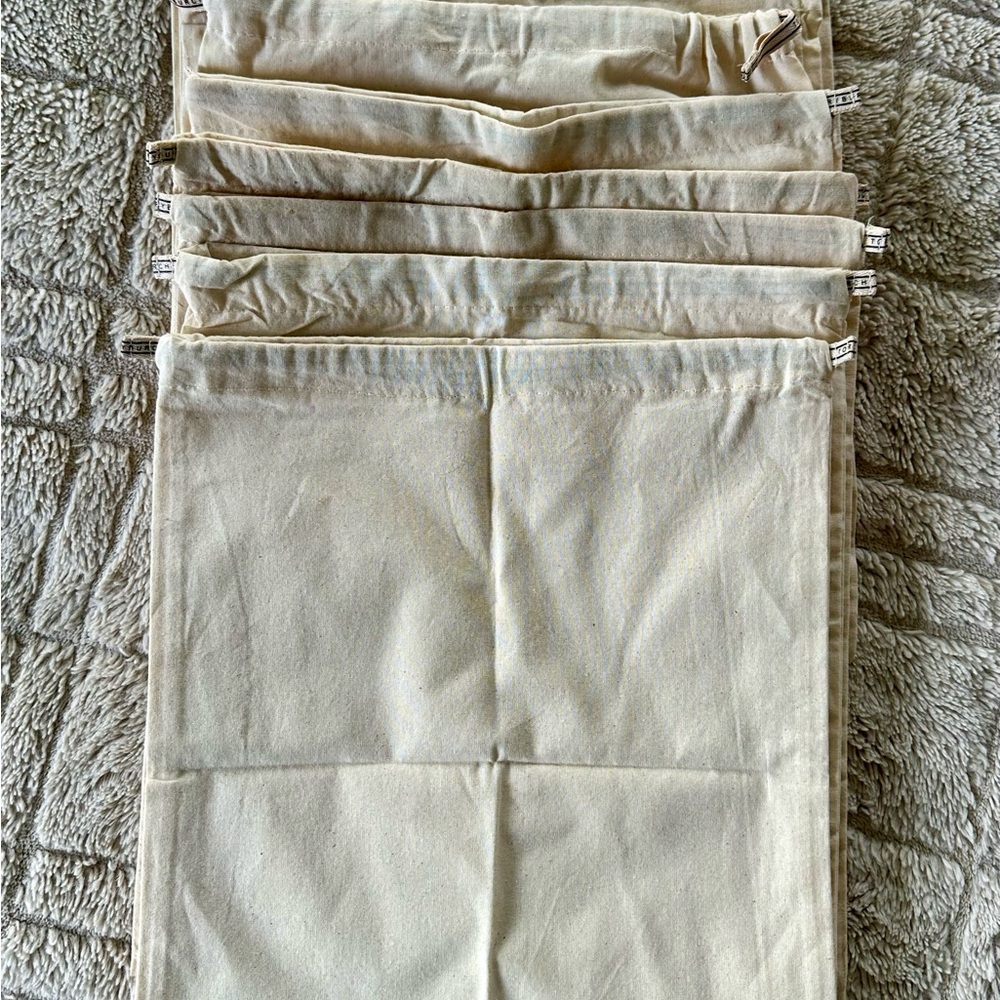 New/unused Tory Burch dust bags - set of 9